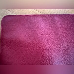 Long champ, Like new red leather portfolio.